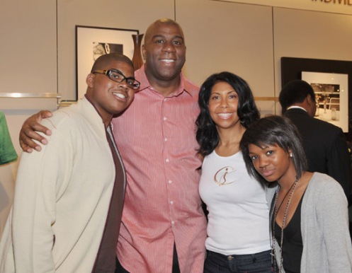 Magic Johnson and his family in 2009; from left to right is EJ, Magic, Cookie, and Elisa.  The photo was taken in L.A. near Nordstrom's (Courtesy: Rolling Out)
